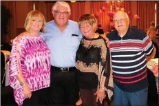  ?? NWA Democrat-Gazette/CARIN SCHOPPMEYE­R ?? Susan Chase and Johnny Bakker (from left) with Kay and Karl Mounger welcome guests to Help the Girls on Sept. 20 at Springdale Country Club.