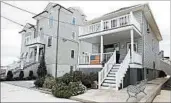  ?? KATHY WILLENS/AP PHOTOS ?? The view of a home in the Belle Harbor section of Rockaway Peninsula, Queens, on Dec. 5, 2012, top, and the same view from Oct. 12, 2017, above.