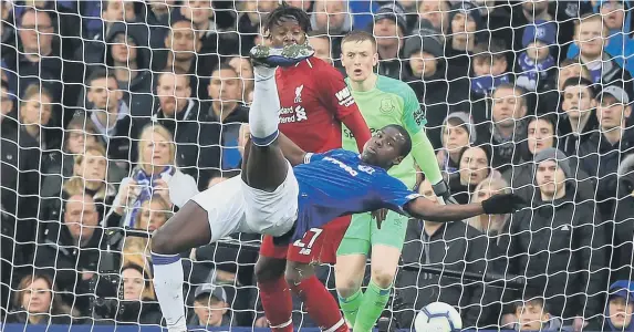  ??  ?? Everton’s Kurt Zouma clears the ball at Goodison Park yesterday.