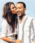  ?? AP ?? John Legend (right) and wife Chrissy Teigen.