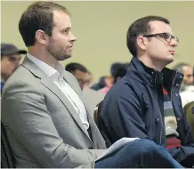  ?? ELIZABETH CAMERON ?? Uber employees Jean-Christophe De Le Rue and Michael van Hemmen listen at Thursday’s committee meeting.