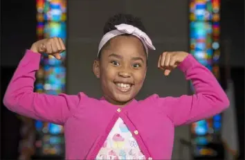  ?? Steph Chambers/Post-Gazette photos ?? Victory Brinker, 8, poses Thursday inside Impact Life Church in Greensburg.