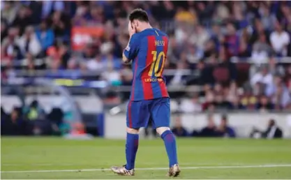  ??  ?? BARCELONA: Barcelona’s Argentinia­n forward Lionel Messi gestures after missing a goal opportunit­y during the Spanish league football match FC Barcelona vs SD Eibar at the Camp Nou stadium.— AFP