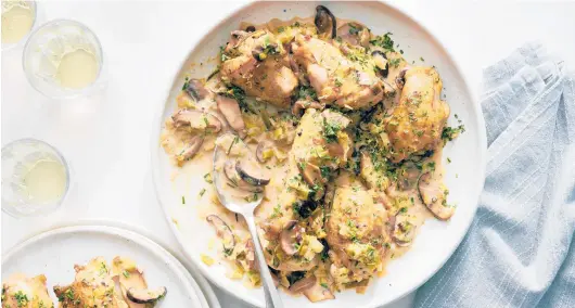  ?? DAVID MALOSH/THE NEW YORK TIMES ?? Wine-braised chicken proves that a deluxe meal does not have to be difficult, time-consuming or all that expensive.