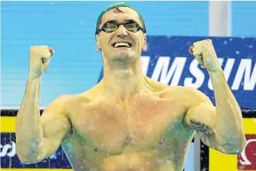  ?? Picture: Reuters ?? Cameron van der Burgh celebrates winning the 100m breaststro­ke final at the world championsh­ips in China, this week.