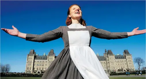  ?? JULIE OLIVER/OTTAWA CITIZEN ?? Parliament Hill was alive on Nov. 20 when Eliza-Jane Scott as Maria showed up to promote the NAC’s stage version of The Sound of Music.