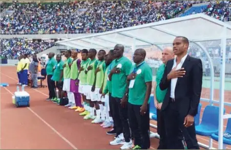  ??  ?? From right: Former Super Eagles Head Coach, Sunday Oliseh and his assistants during one of the matches he was incharge of the senior Nigerian football team. Now, a legal battle is looming with the federation following his resignatio­n last Friday.