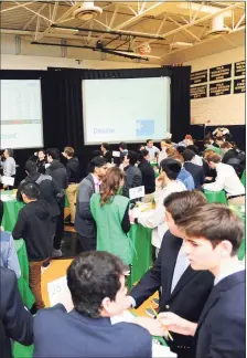  ?? File photo ?? Students from seven high school compete in the Junior Achievemen­t Student Stock Market Exchange Challenge in 2018.