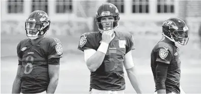  ?? AMY DAVIS/BALTIMORE SUN ?? Coach John Harbaugh knows how he’ll use, from left, Lamar Jackson, Joe Flacco and Robert Griffin III in the preseason opener.