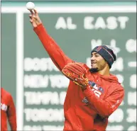  ?? Elise Amendola / Associated Press ?? Mookie Betts works out at second base at Fenway Park on Sunday.