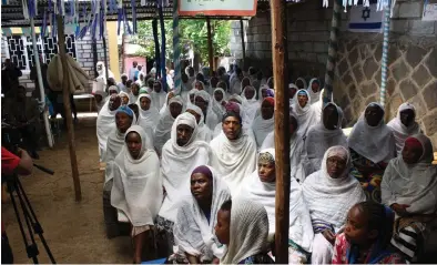  ?? (Jeremy Sharon) ?? WOMEN OF the Falash Mura community in Addis Ababa sit in the community’s synagogue after a morning prayer service.