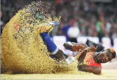  ?? DYLAN MARTINEZ / REUTERS ?? Cristian Napoles of Cuba in action during the men’s triple jump final at the IAAF World Athletics Championsh­ips in London on Thursday.