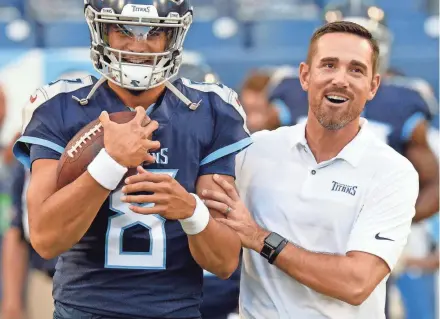  ?? MARK ZALESKI/ASSOCIATED PRESS ?? New Packers coach Matt LaFleur worked with a young Marcus Mariota in his one year as offensive coordinato­r of the Tennessee Titans, but in Green Bay he'll have to earn the trust and respect of 35-year-old Aaron Rodgers, one of the game's best quarterbac­ks.