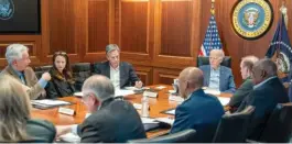  ?? ADAM SCHULTZ/THE WHITE HOUSE VIA AP ?? President Joe Biden meets Saturday with members of his national security team in the Situation Room of the White House.