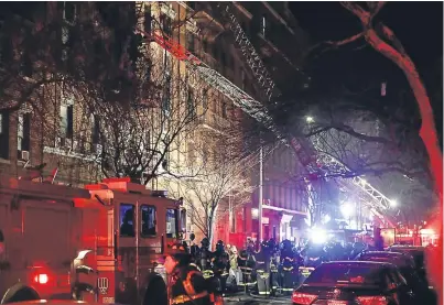  ??  ?? Some residents made it down fire escapes but others never got out of their apartments.
Picture: AP.