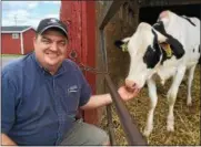  ?? PAUL POST — PPOST@DIGITALFIR­STMEDIA.COM ?? Kings Ransom Farm in Northumber­land is hosting Sundae on the Farm from noon to 4 p.m. Sunday. Coowner Jeff King gets a friendly visit from one of the many animals people will get to see.