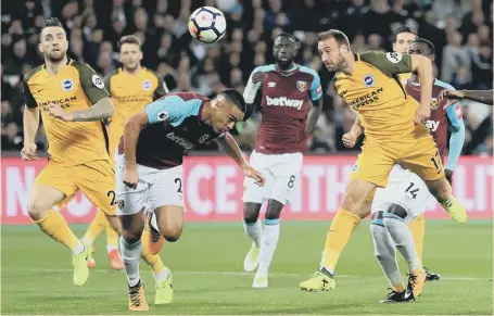  ??  ?? Glenn Murray heads Brighton in front on the way to last night’s convincing 3-0 Premier League win at West Ham.