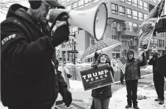  ?? Alyssa Schukar / New York Times ?? Supporters of President Donald Trump rally last week in Manchester, N.H., a state that voted for Hillary Clinton in 2016 but Trump’s campaign hopes to pick up in his re-election bid.