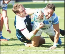  ??  ?? Argentina’s Joaquin Tuculet reaches out to score a try during the Rugby World Cup Pool C game at Kumagaya Rugby Stadium between Argentina and the
United States in Kumagaya City, Japan on Oct 9. (AP)