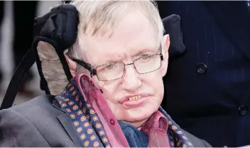  ?? JOEL RYAN / INVISION / THE ASSOCIATED PRESS ?? Shortly before his death, Stephen Hawking, shown in 2015, began compiling the answers to 10 fundamenta­l questions he was frequently asked by readers.