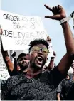  ?? AFP ?? PROTESTERS demonstrat­ed against the economic crisis at the president’s office in Colombo on Tuesday. Sri Lanka announced a default on its $51 billion (about R743bn) foreign debt escalating demands for the government to resign. |