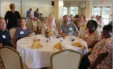  ?? PHOTO BY MICHILEA PATTERSON – FOR MEDIANEWS GROUP ?? A table of guests pose for a photo during the 2019Home Garden Contest awards ceremony held at Brookside Country Club on Aug. 25. Winners took home cash prizes.