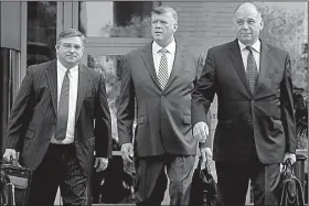  ?? AP/JACQUELYN MARTIN ?? Members of Paul Manafort’s legal defense team (from left) Richard Westling, Kevin Downing and Thomas Zehnle walk to court Thursday where jury deliberati­ons began in Manafort’s trial in Alexandria, Va.