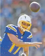  ?? KELVIN KUO THE ASSOCIATED PRESS ?? The Chargers, lead by quarterbac­k Philip Rivers, are on a four-game win streak headed into Saturday’s matchup against the Chiefs. The winner will be in command of the AFC West and a run at the playoffs.