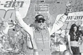  ??  ?? Monster Energy NASCAR Cup Series driver Matt Kenseth celebrates after his victory Sunday in the Can-Am 500 race at Phoenix Internatio­nal Raceway. JOE CAMPOREALE/USA TODAY SPORTS