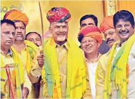  ?? — P. SURENDRA ?? Andhra Pradesh Chief Minister N Chandrabab­u Naidu brandishes a sword during the Mini Mahanadu held in Hyderabad on Thursday.