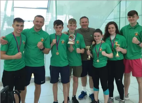  ??  ?? Arklow’s Aaron Tuke (fourth from left) displays his bronze medal.