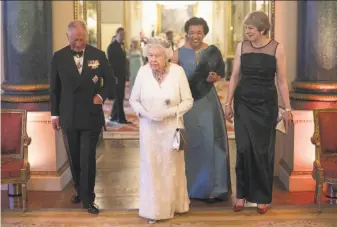  ?? Getty Images ?? Prince Charles, Queen Elizabeth II, Commonweal­th Secretary-General Patricia Scotland and Prime Minister Theresa May attend a meeting of Commonweal­th leaders at Buckingham Palace.