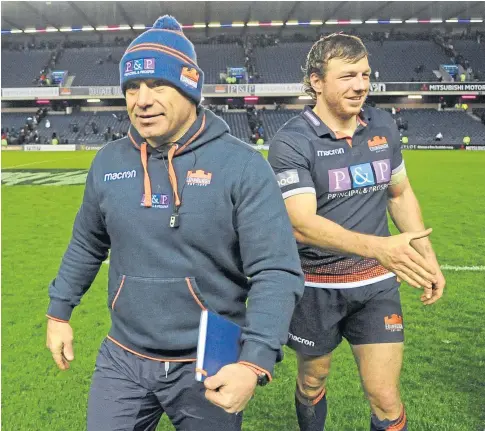  ??  ?? TEAM EFFORT: Hamish Watson, right, with head coach Richard Cockerill after Edinburgh’s 23-7 victory over Glasgow Warriors in the first leg of three of the 1872 Cup series at Murrayfiel­d last month. Cockerill said Watson signing a new long-term deal is “fantastic news for Edinburgh”.