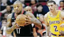  ?? Elizabeth Conley / Staff photograph­er ?? Forward P.J. Tucker, left, is one of the key ingredient­s in the improving defense for the Rockets.