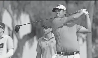  ?? PGA TOUR ?? Carl Yuan Yechun tracks a tee shot during the third round of the Korn Ferry Tour’s Club Car Championsh­ip at The Landings Club in Savannah, Georgia on Saturday. Yuan fired 10 birdies on Sunday to finish in a tie for seventh, three shots off winner Adam Svensson.