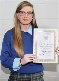  ??  ?? Clodagh Cronin proudly displaying her the Student of the Year certificat­e.