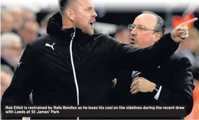  ??  ?? Rob Elliot is restrained by Rafa Benitez as he loses his cool on the sidelines during the recent draw with Leeds at St James’ Park