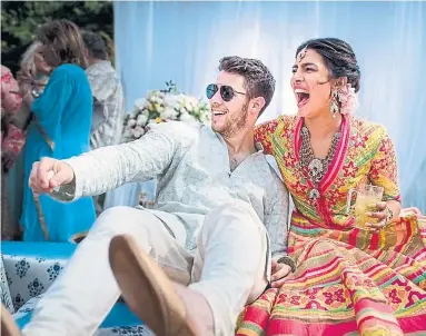  ?? THE ASSOCIATED PRESS ?? The wedding of Nick Jonas and Priyanka Chopra was one of two relationsh­ips that defined 2018, Shinan Govani writes.