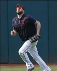  ?? RON SCHWANE — THE ASSOCIATED PRESS ?? Jason Kipnis works in the outfield before a game against the Tigers on Sept. 11 in Cleveland. The Indians will be testing Kipnis in the outfield after the injury to Bradley Zimmer.