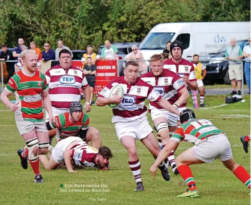  ?? Tim Taylor ?? ●●Kyle Parry carries the ball forward for Rochdale