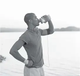  ?? GETTY IMAGES ?? When you exercise, extra fluids are lost through perspirati­on, which must be replaced in order to avoid becoming dehydrated.