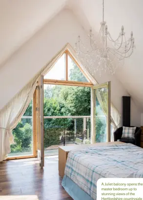  ??  ?? A Juliet balcony opens the master bedroom up to stunning views of the Hertfordsh­ire countrysid­e