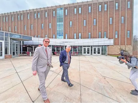 ?? ?? Ohio State University president Walter “Ted” Carter Jr. leaves Ovalwood Hall in Mansfield after touring the Pearl Conard Art Gallery. Carter visited the university’s regional campuses for the first time in his presidency this past week.