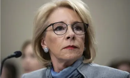  ??  ?? Betsy DeVos, the education secretary, announced the new rules against the wishes of attorneys general of 17 states and several education organizati­ons, who had asked for a delay. Photograph: Alex Brandon/AP