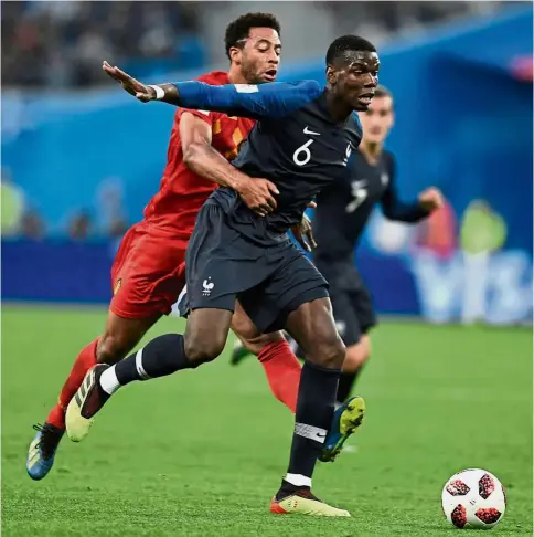  ?? — AFP ?? No you don’t: Belgium midfielder Moussa Dembele (left) vying for the ball with France midfielder Paul Pogba during the semi-finals at the St Petersburg Stadium on Tuesday.