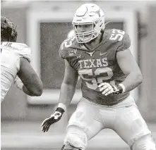  ?? Getty Images ?? UT offensive lineman Sam Cosmi has two more years of college eligibilit­y but could declare for the NFL draft after next season.