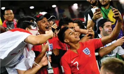  ?? Photograph: Imaginechi­na/ REX/Shuttersto­ck ?? Jesse Lingard takes a selfie with his family and friends after England beat Colombia in the 2018 World Cup.