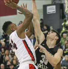  ?? Andrew Stein/Post-Gazette ?? Demetris McKnight did not play basketball last year but is New Castle's leading scorer this year as a junior.