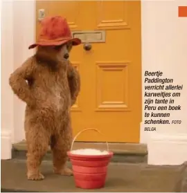  ?? BELGA
FOTO ?? Beertje Paddington verricht allerlei karweitjes om zijn tante in Peru een boek te kunnen schenken.