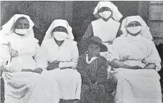  ?? STUFF ?? The flu epidemic of 1918 hit Ma¯ori communitie­s particular­ly hard. Pictured are nurses at Ma¯ori Hospital in Temuka, South Canterbury.